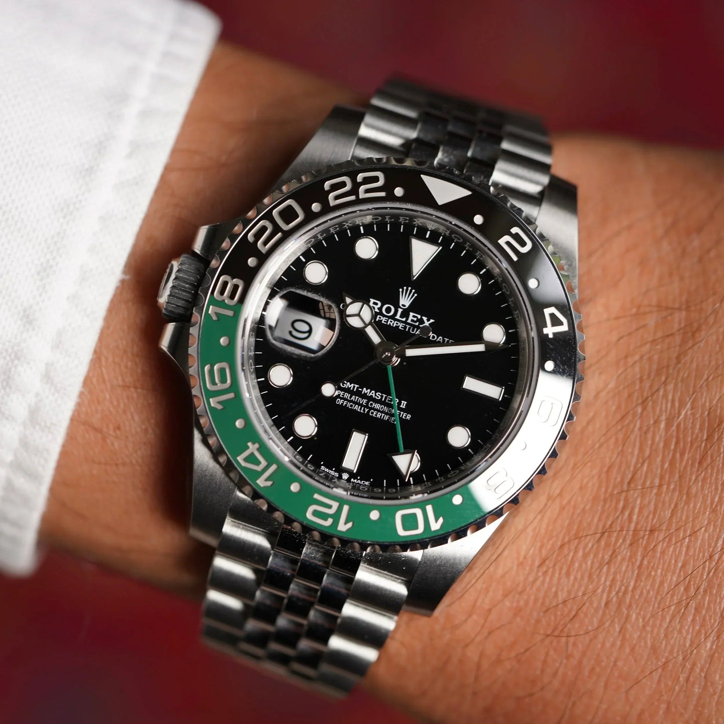 GMT-Master II "Sprite" reference 126720VTNR watch with a black and green Cerachrom bezel insert and a Jubilee bracelet.