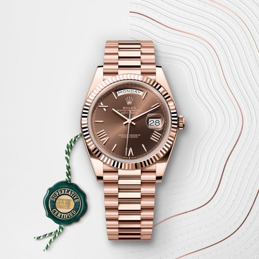 Rolex Day-Date 40 crafted in 18 ct Everose gold with a chocolate dial and a President bracelet.