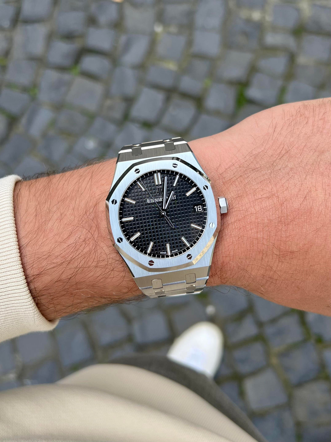 Audemars Piguet Royal Oak, a luxury sports watch known for its octagonal bezel and integrated bracelet.